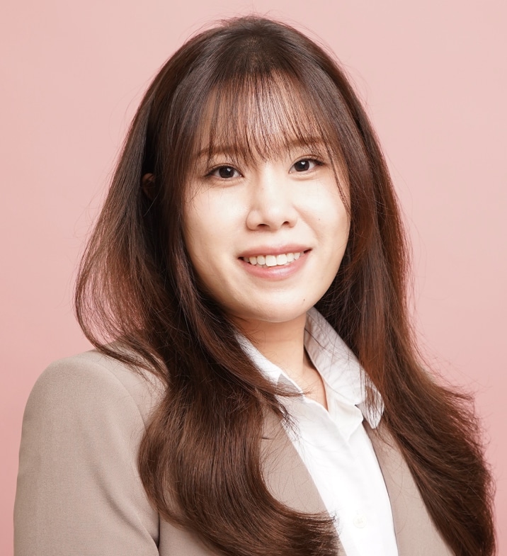 Portrait of Lien Nguyen, PA-C, smiling in a tan blazer