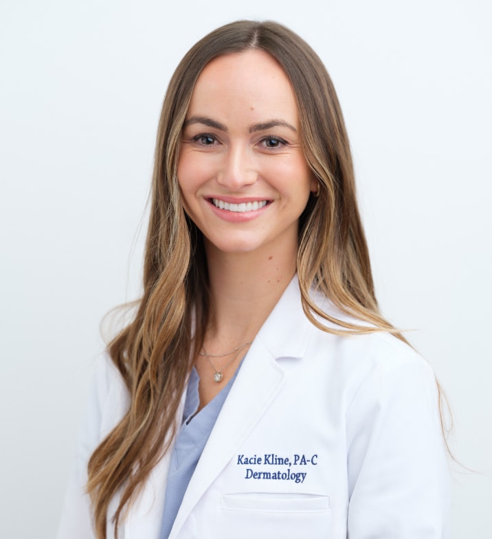 Portrait of Kacie Kline Condon, PA-C, smiling in a white coat